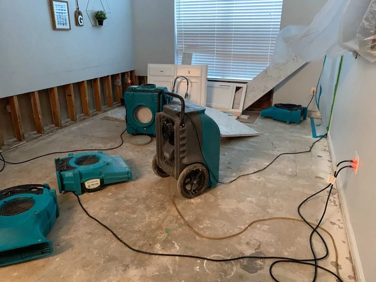 Dehumidifier in flood-cut room for Water Damage Restoration in Elkton